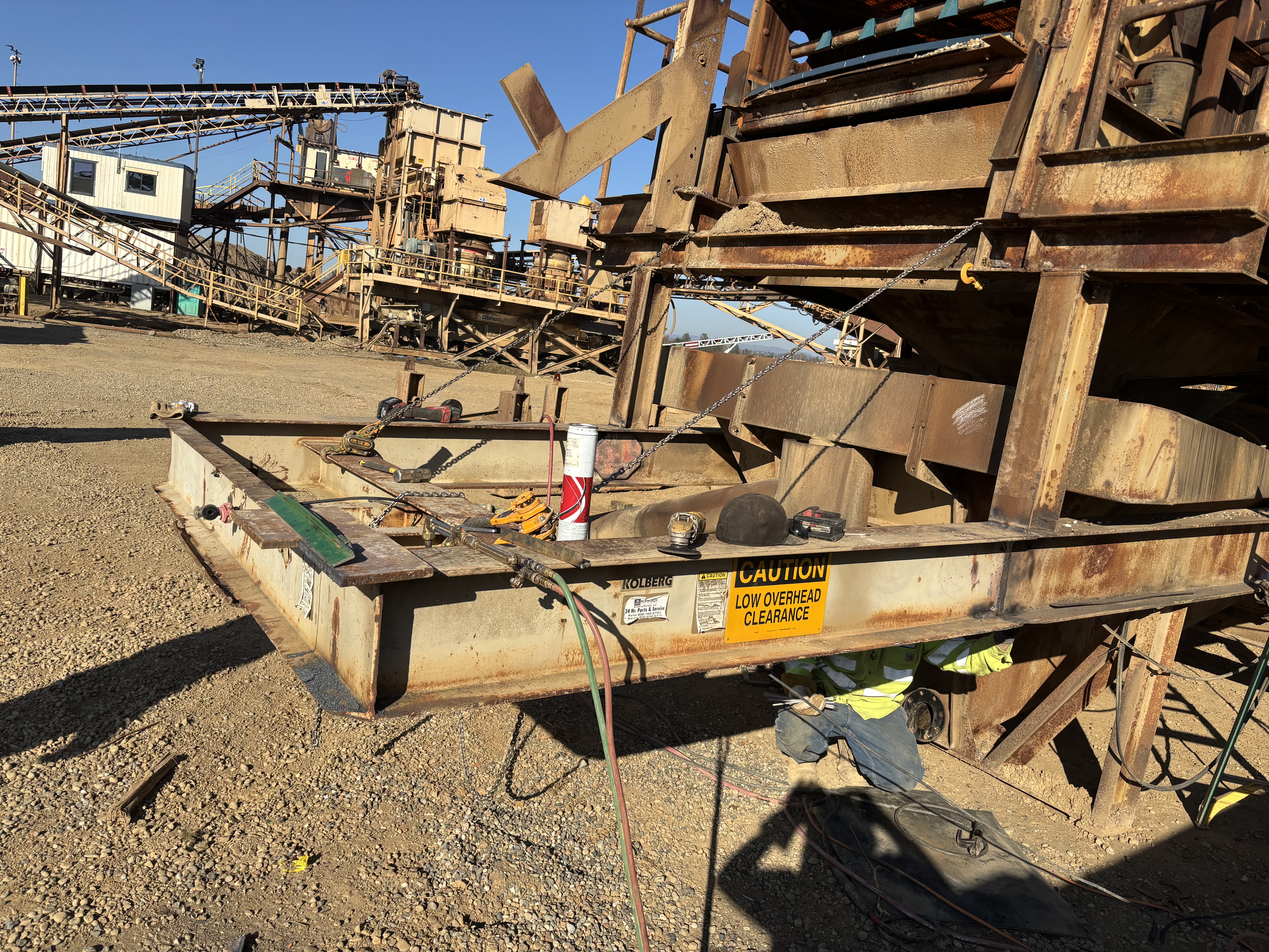 Pit feeder during rebuild with new steel skirtboards being welded